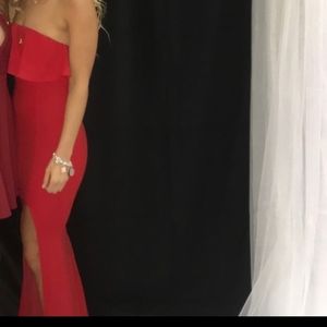 Red strapless maxi dress with slit